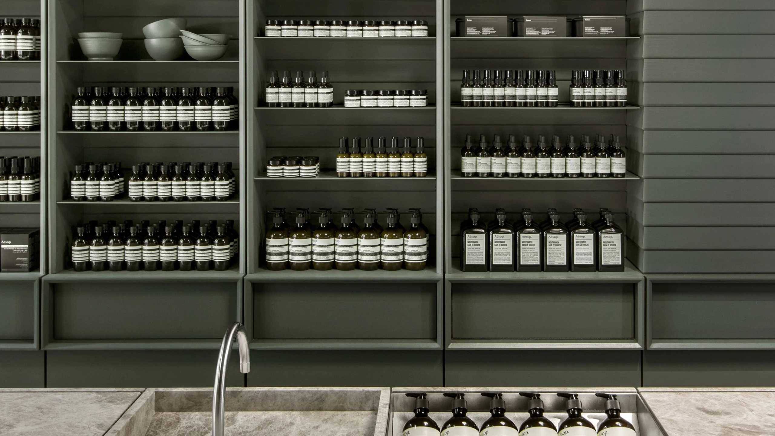 Close-up shot of basin, looking onto wall in Aesop San Francisco Centre
