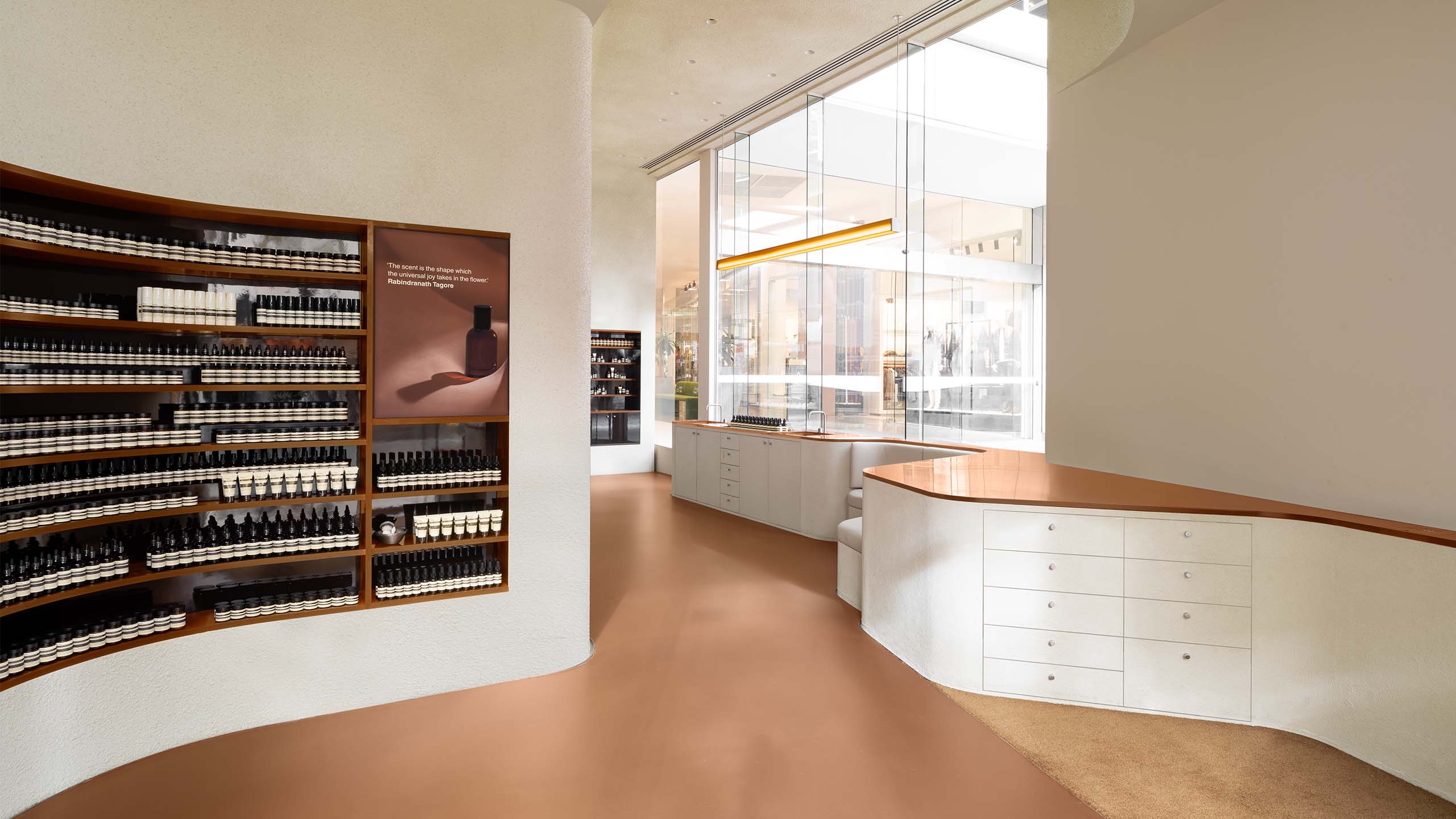 Aesop Perth City store interior with brown floor and wooden bench tops