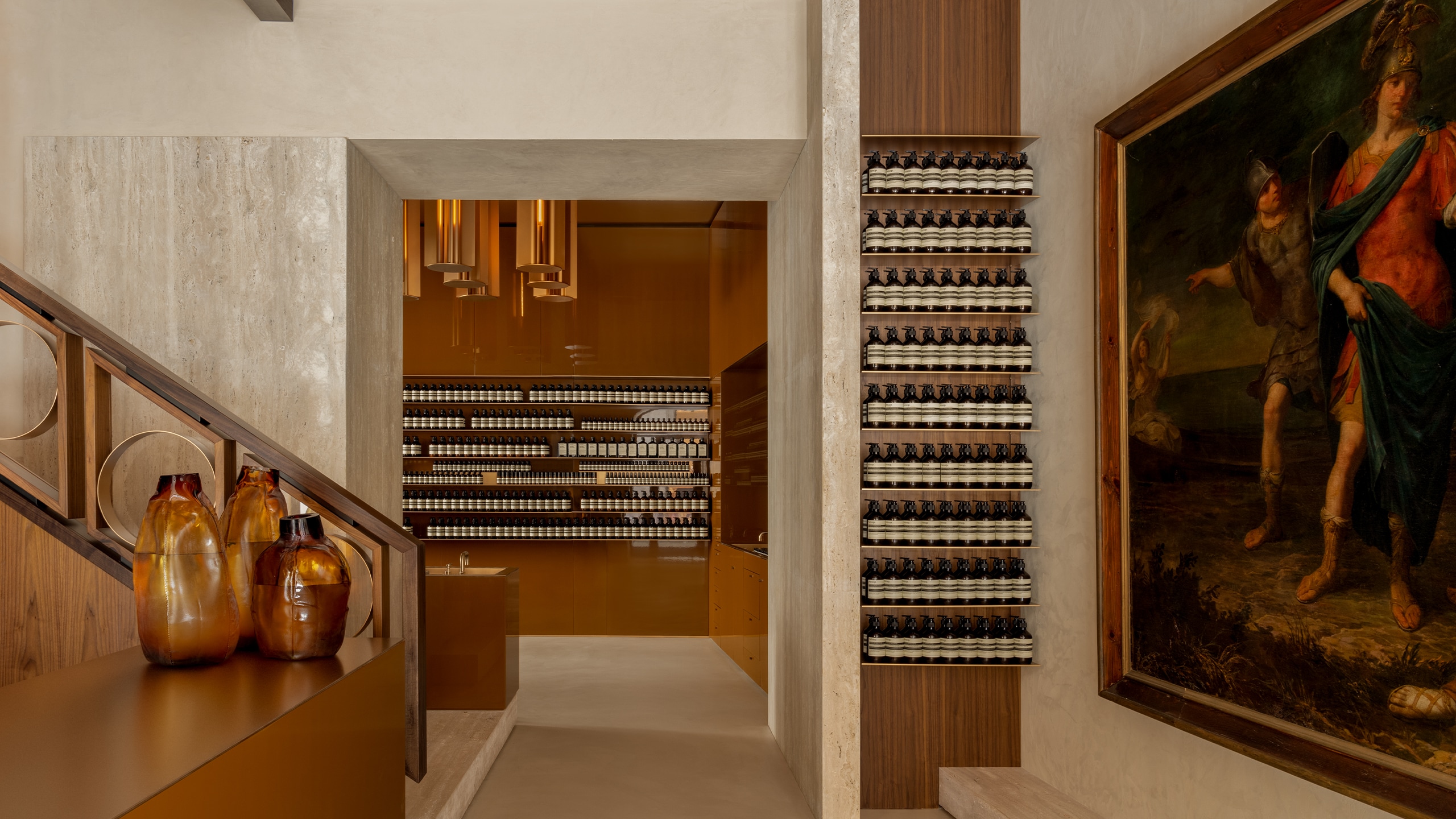 Aesop Via del Corso store interior featuring oil painting and product display at basin.