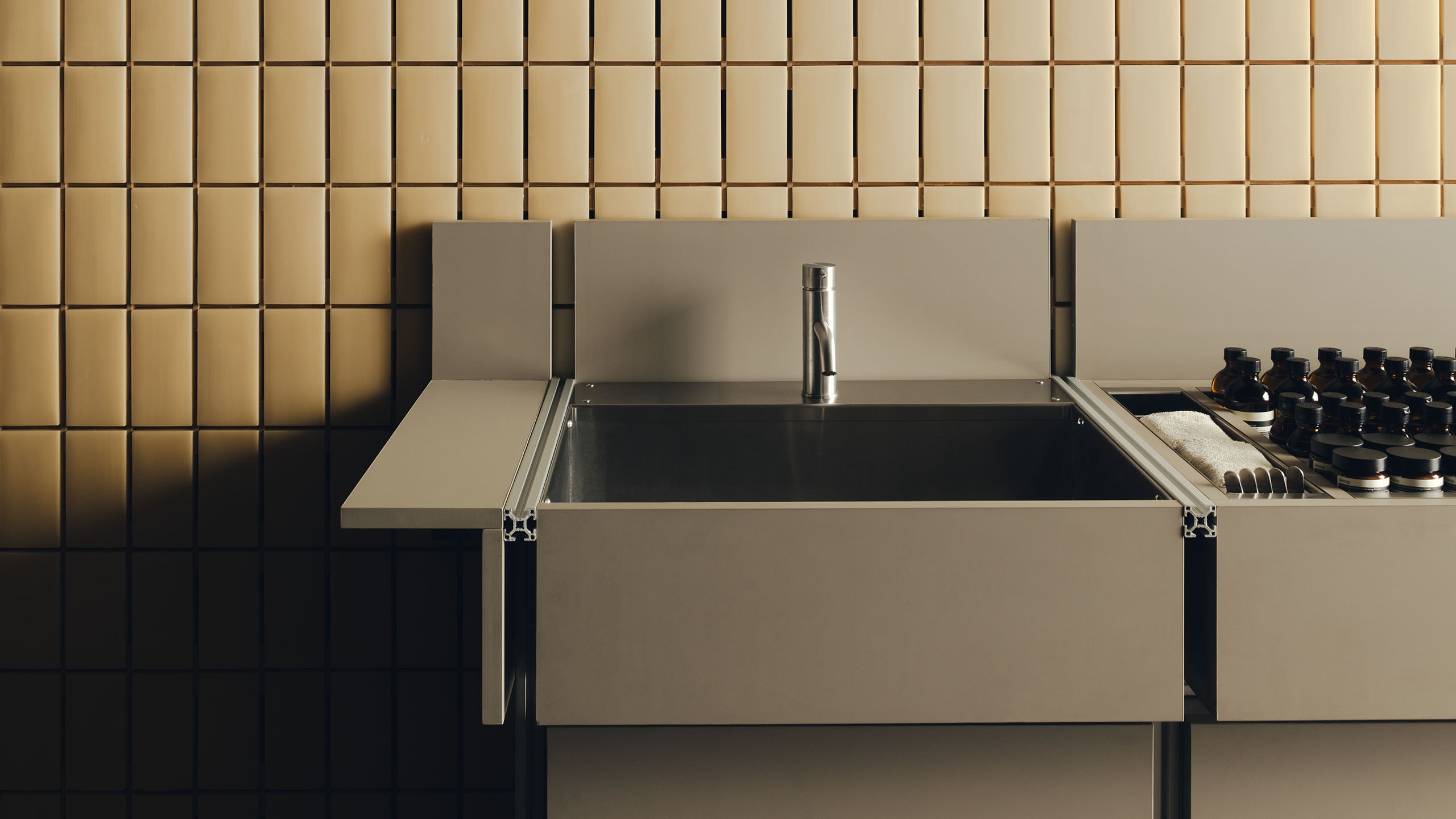 Aesop Knightsbridge store interior basin, taps and bar soap fixings.