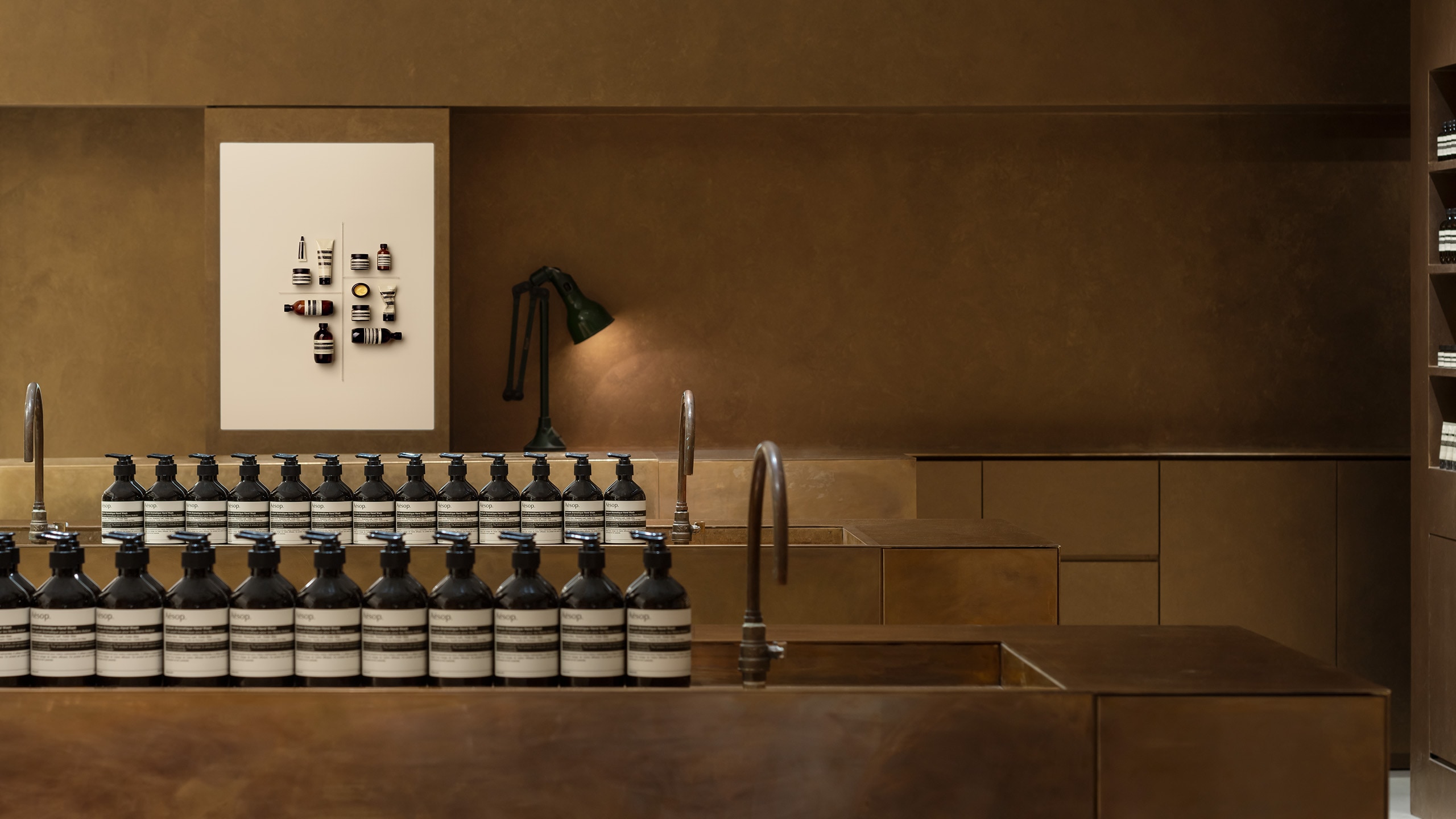 Aesop Amu plaza interior, basin with golden colour