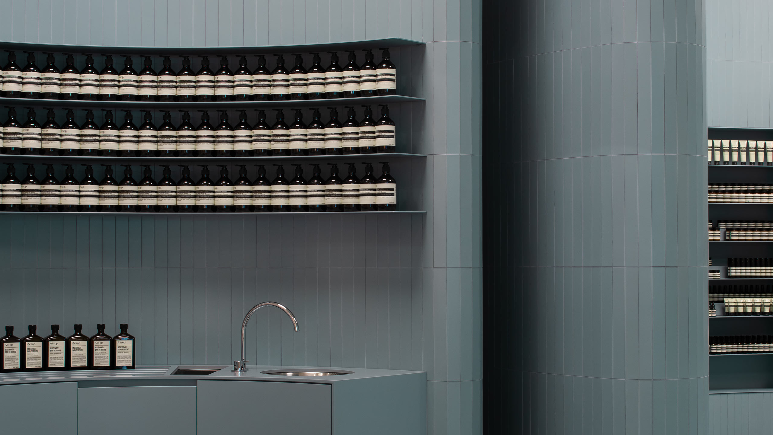 One of the rounded corners of Aesop Karrinyup, feautring a basin.