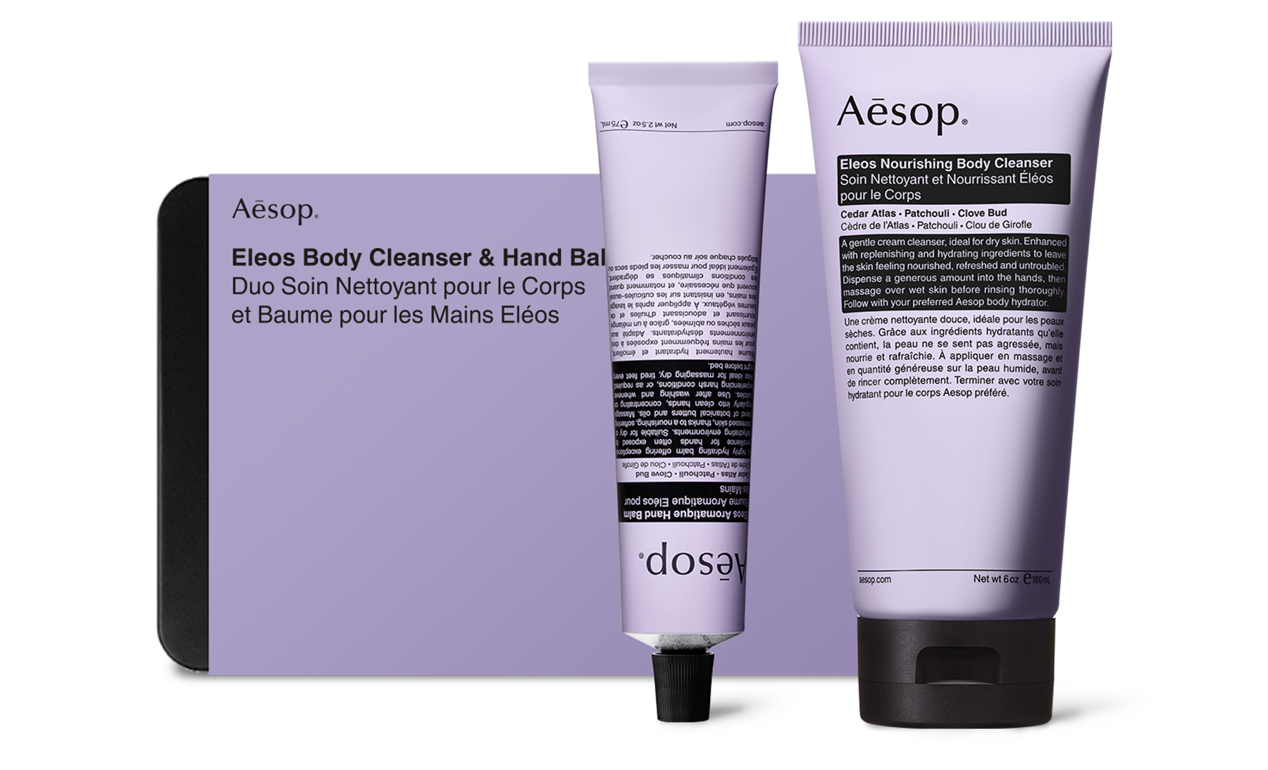Eleos Aromatique Hand Balm and  Eleos Nourishing Body Cleanser placed front of tin box
