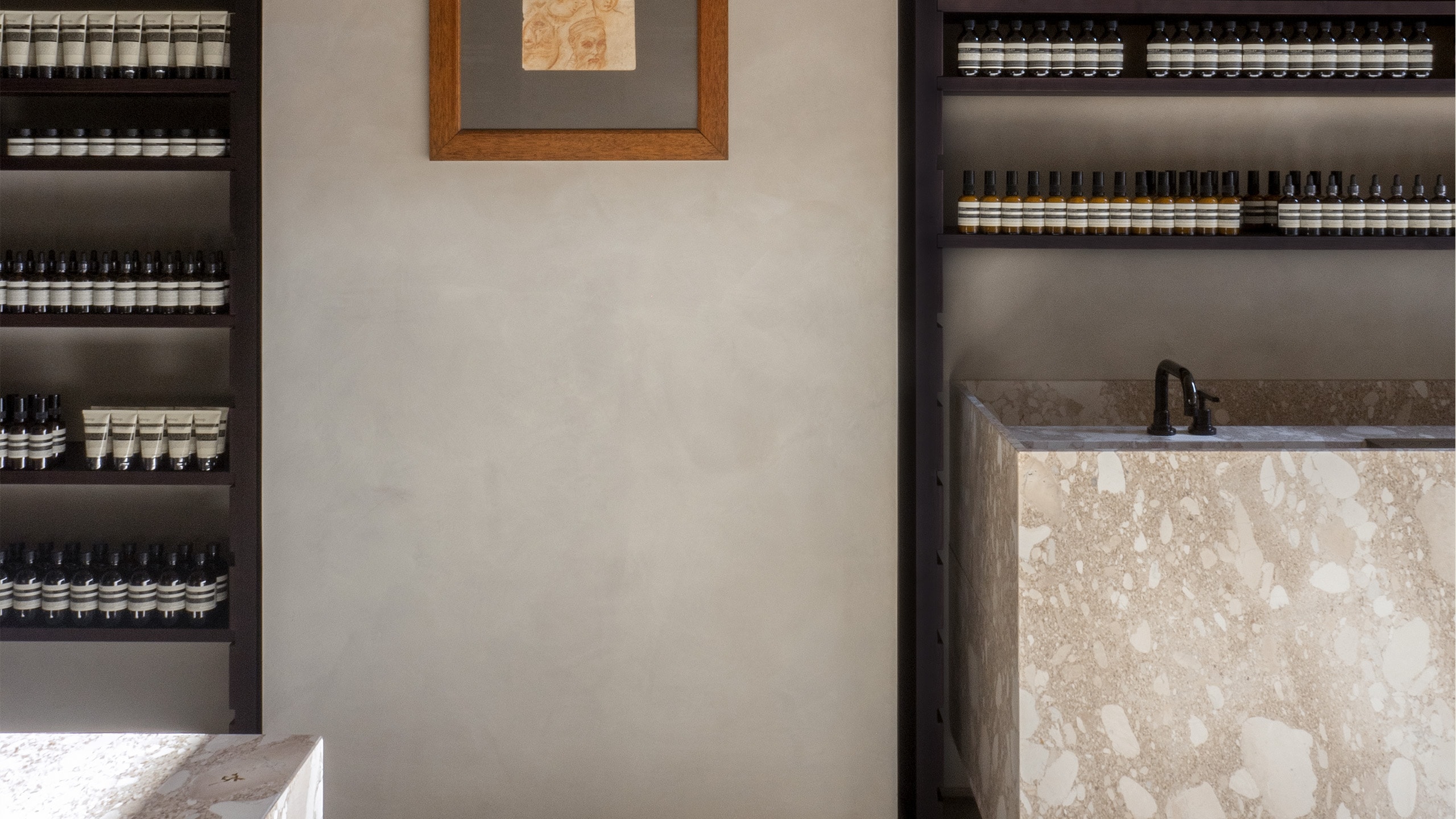 Aesop Firenze store display with product and basin