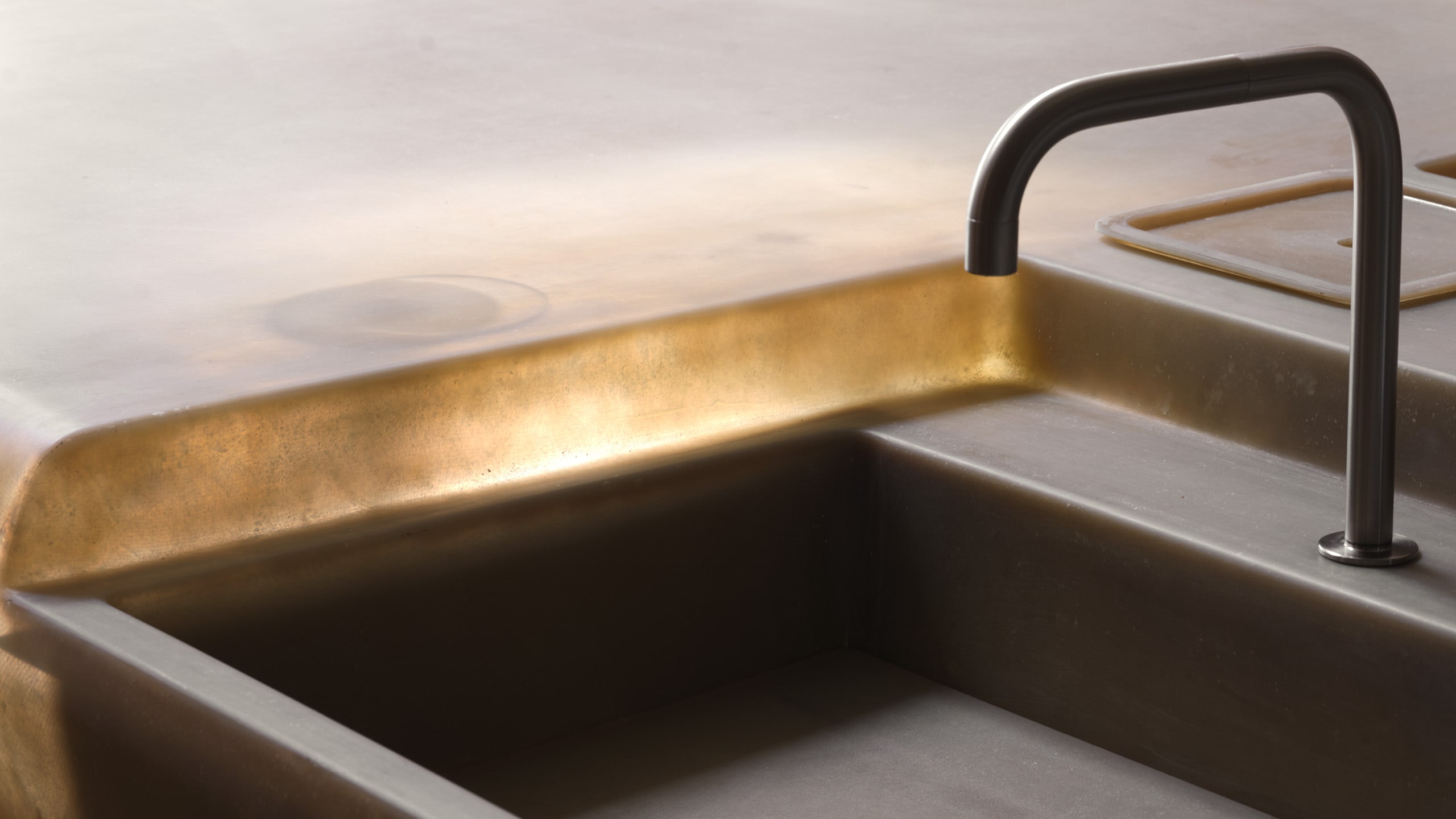 detail shot of basin of brushed bronze