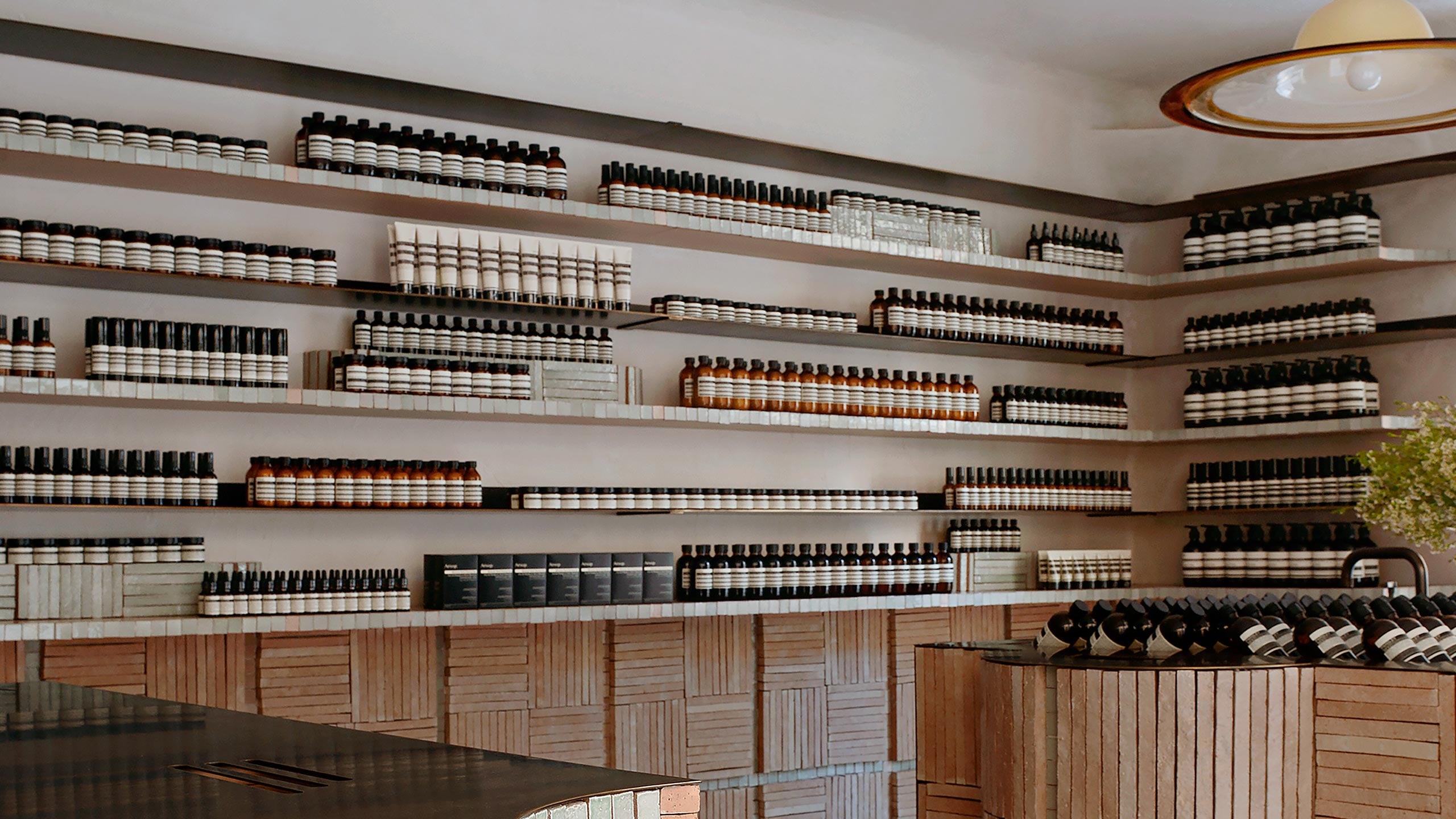 Aesop Aix-en-Provence store interior product wall display.