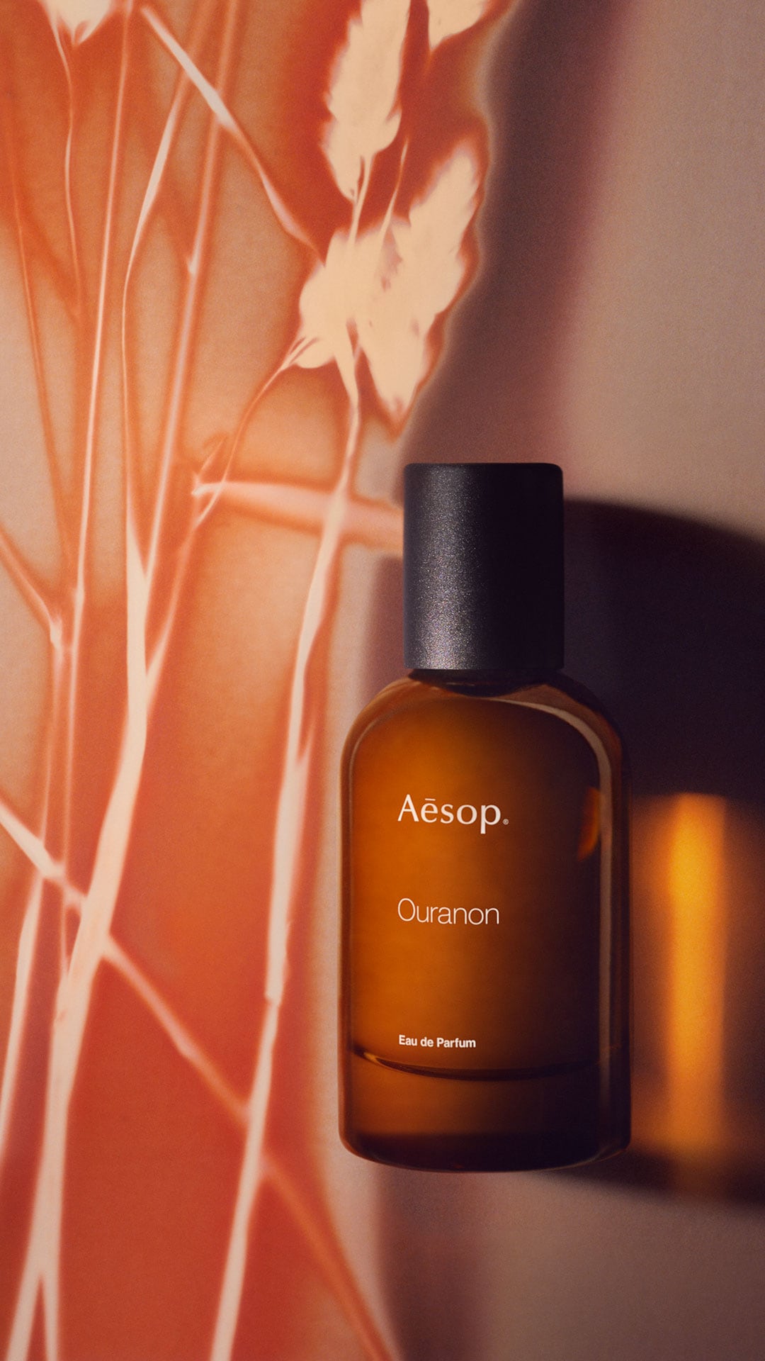 Ouranon Eau de Parfum on an abstract background