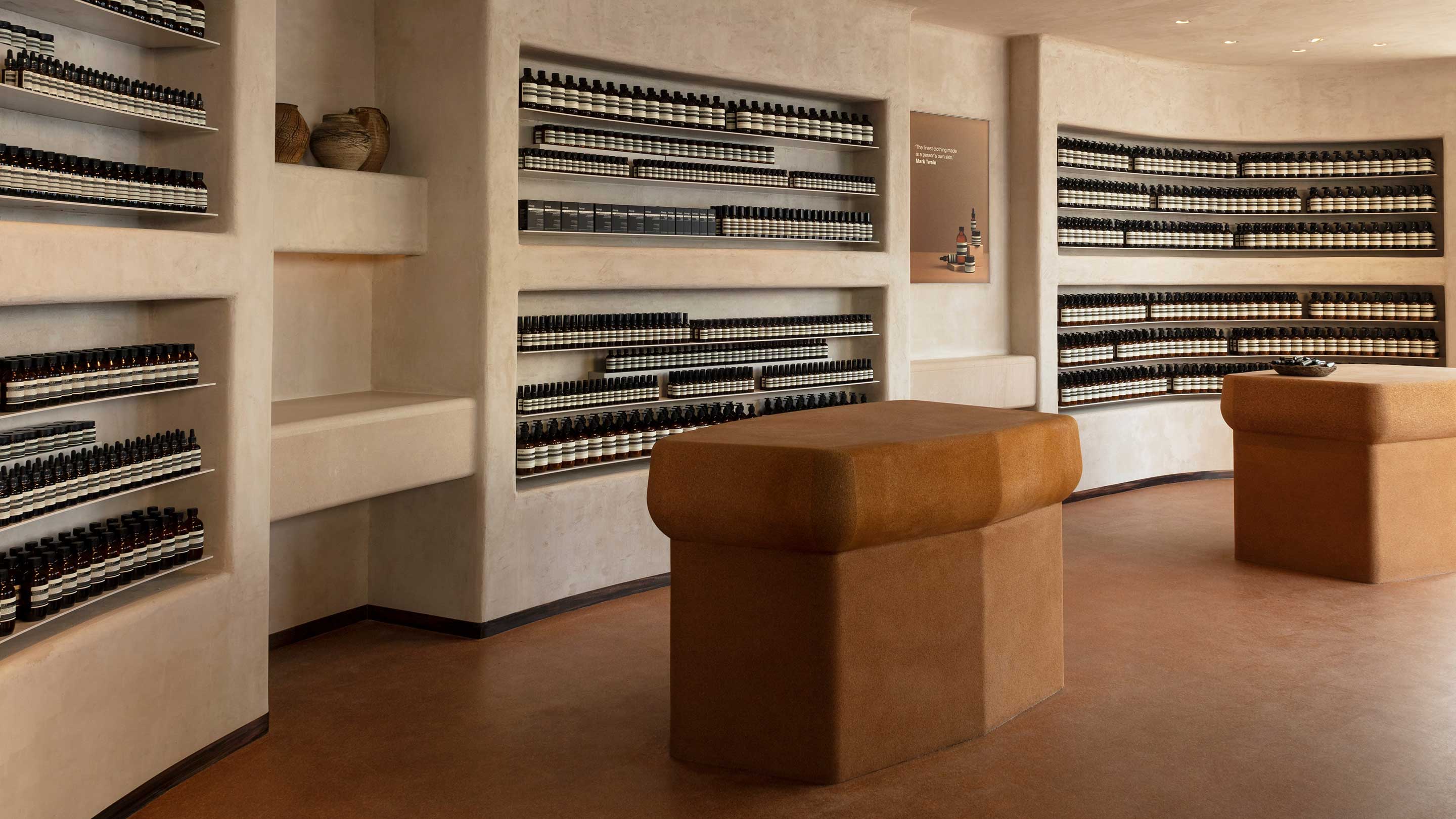 Aesop Northcote Road interior, featuring elegantly curved walls and island benchtops