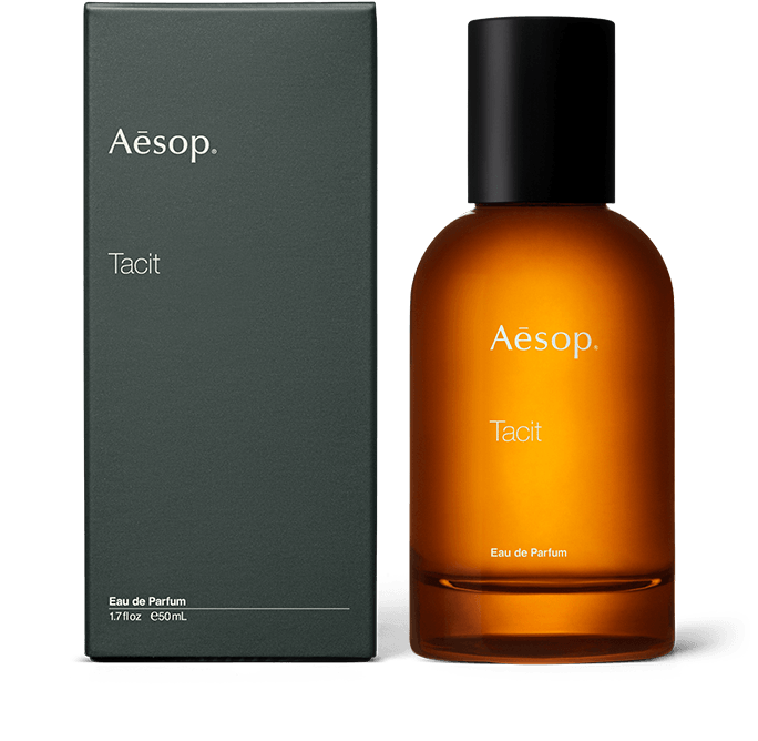 Tacit Eau de Parfum in amber glass bottle with outer carton 