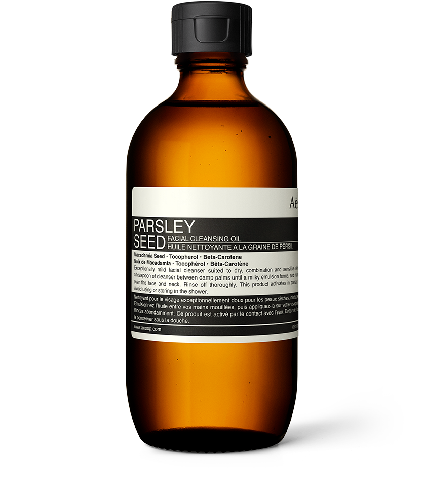 Aesop’s Parsley Seed Facial Cleansing Oil in amber bottle; a water-soluble oil for most skin types and makeup removal.